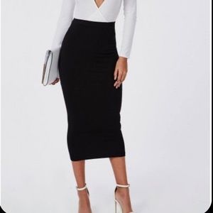 MISGUIDED Jersey pencil skirt. Size IS 8